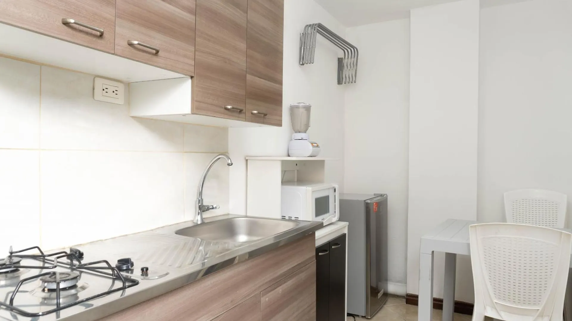 Hotel Palo Alto Laureles Медельин