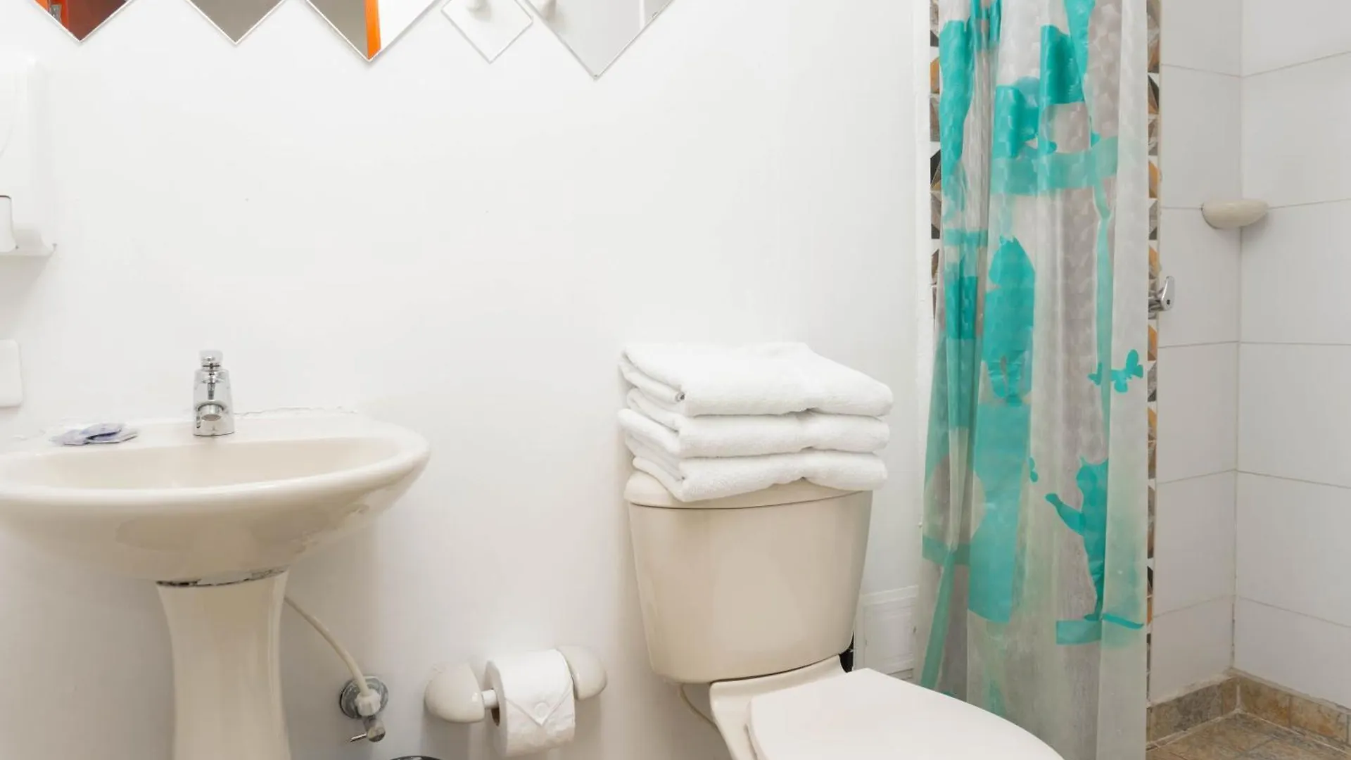 Hotel Palo Alto Laureles Медельин